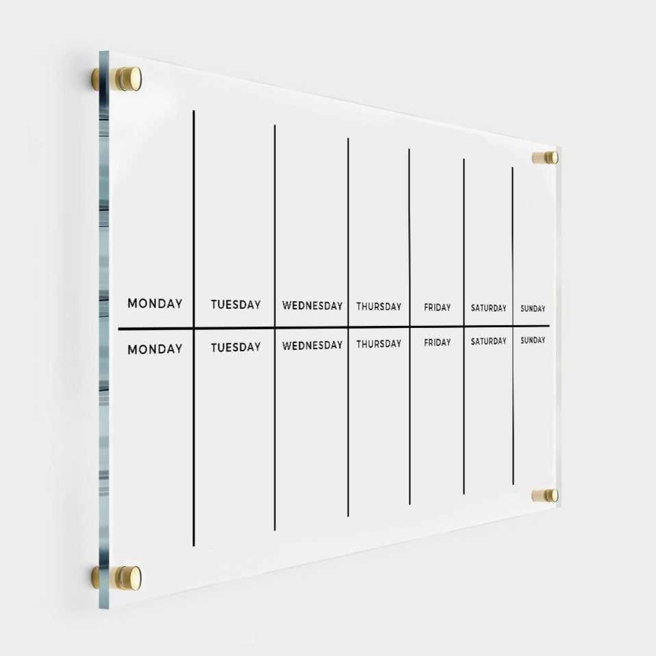 Landscape acrylic two-week planner with fourteen daily spaces arranged in two rows of seven, shown with gold wall mounts.